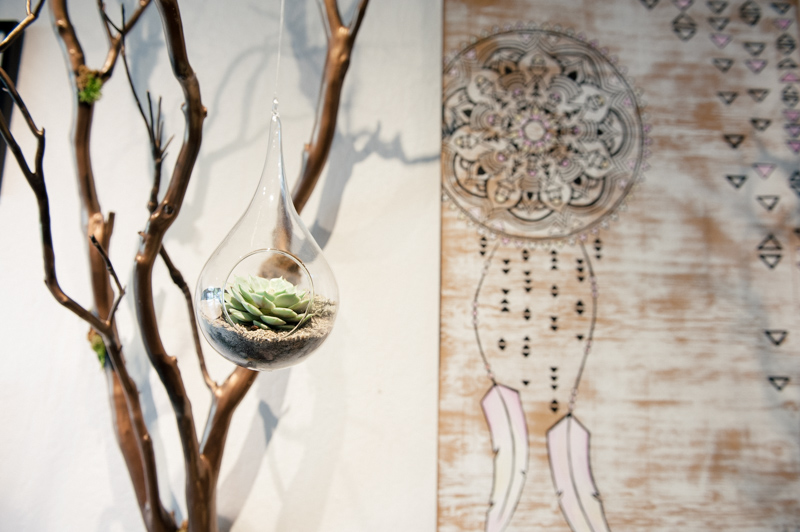 Plants, found items, and artwork all blend seamlessly.